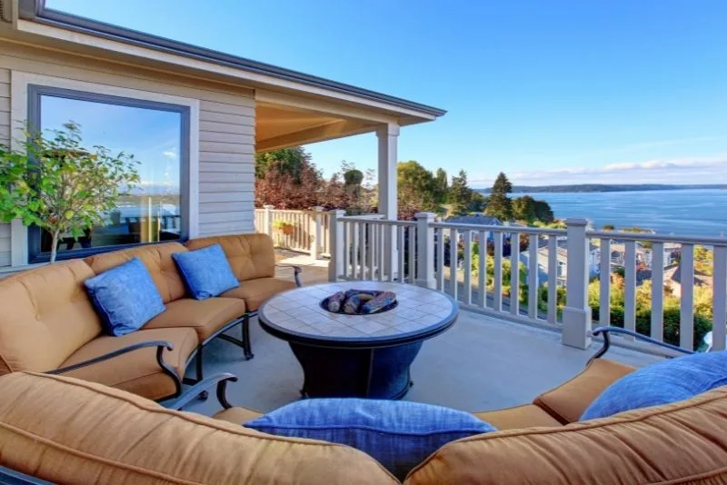 A patio with beige seats